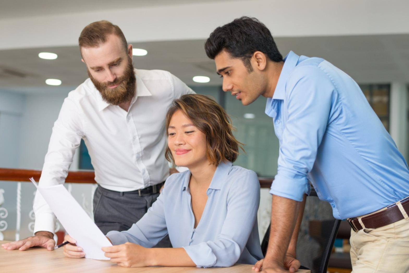 Financial analyst reviewing quarterly statements with focused concentration